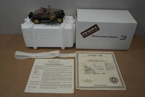 lot 45 image: Danbury Mint 1931 Ford Model A Roadster Die-Cast Model