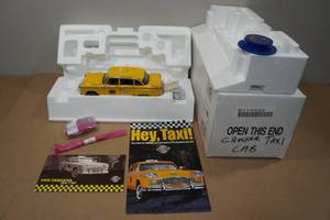 lot 50 image: Franklin Mint Checkered Taxi Cab Die-Cast Model
