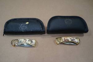 lot 89 image: 2 Franklin Mint Pocket Knives -Deer & Fish Themed