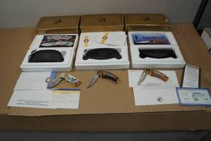 lot 105 image: 3 Franklin Mint Pocket Knives -Eagle and Fish Themed