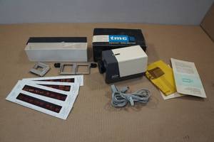 lot 113 image: Vintage Pocket TMC Projector