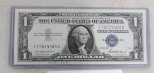 lot 157 image: 1957 BU  $1 SILVER CERTIFICATE STAR NOTE WASHINGTON SERIAL #72879560C SEQUIAL WITH LOT 156,158