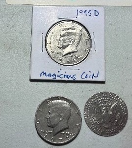 lot 15 image: 2- MAGICIANS HALF DOLLAR COINS