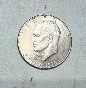 lot 21 image: 1976 US DOLLAR COIN IKE