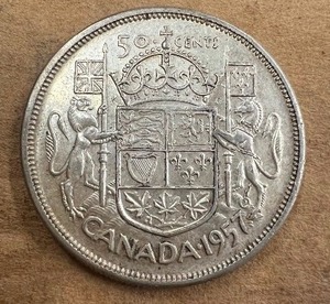 lot 231 image: 1957 CANADA 50 CENT COIN  80% SILVER NOT COMMON VF
