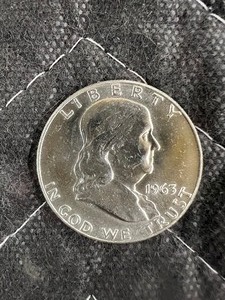 lot 106 image: 1963D BENJAMIN FRANKLIN AUBU 90% SILVER HALF DOLLAR  BUY LOT 94-113 TO OWN A COMPLETE ROLL