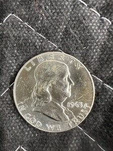 lot 107 image: 1963D BENJAMIN FRANKLIN AUBU 90% SILVER HALF DOLLAR  BUY LOT 94-113 TO OWN A COMPLETE ROLL