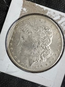 lot 207 image: 1889 $1 MORGAN DOLLAR 90% SILVER