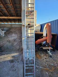 lot 70 image: Used 20ft Werner Aluminum Extension Ladder 200lb Load Capacity