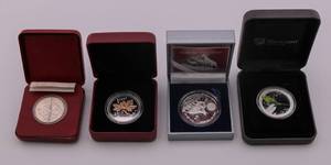 lot 16 image: 1 Oz Silver Coin Lot of 4