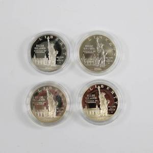 lot 49 image: 1986 Statue of Liberty Commemorative $1 Dollar Coin Lot of 4 - 90% Silver