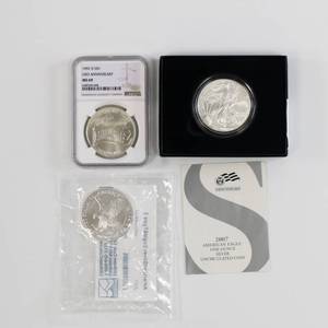 lot 61 image: US $1 Dollar Lot - 2 Silver Eagle, 1 Commemorative US Dollar