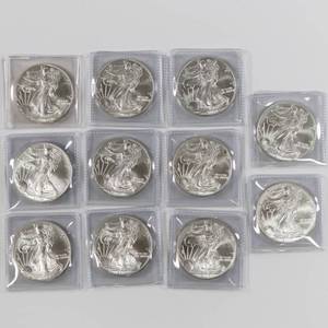 lot 52 image: 2004 American Silver Eagle - 1 oz Fine Silver Lot of 11