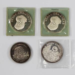 lot 51 image: 1 Ounce Silver Christmas Rounds Lot of 4