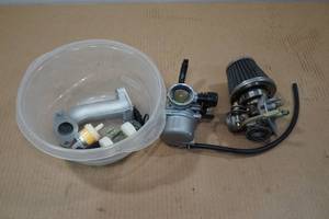 lot 136 image: Import 4 Wheeler Carburetor and Parts