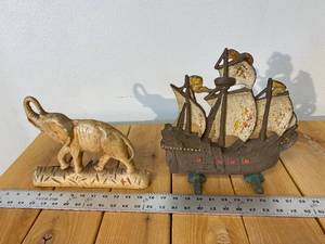 lot 23-A2025 image: (2) Antique Cast Iron Door Stoppers An Elephant and A Sailing Ship, Both Painted