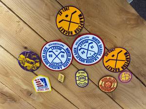lot 31-A2025 image: Lot of 7 Vintage 1980s North Dakota & Wahpeton Hockey Patches & Wahpeton 197172 Football 3 Pin