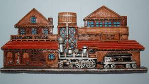 lot 23 image: Ceramic Train Station Wall Hanging