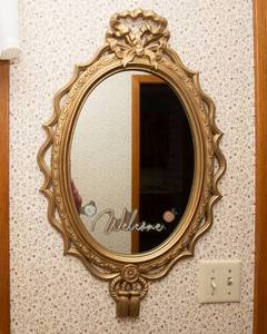 lot 137 image: Oval Gold-Tone Wall Mirror