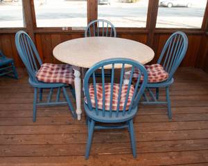lot 153 image: White Circle Table with Four Blue Chairs