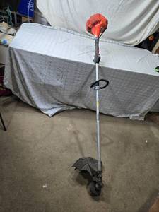 lot 13 image: Efco 8725 Gasoline String Trimmer