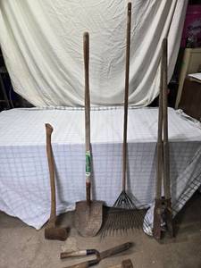lot 15 image: Rake, Spade, Hatchet, Axe, Post Hole Digger