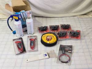 lot 45 image: Automotive Tools and Accessories - 1 Can AC, Digital Tire Gauges, Jumper Cables and More