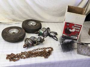 lot 48 image: Vintage Drills, Old Rubber Tires, and Chimney Cleaning Brush Kit