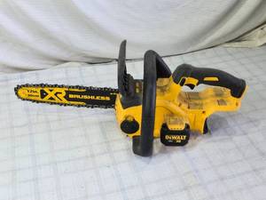 lot 57 image: Dewalt 12-inch 20V Brushless Chainsaw Model DCCS620 - Seller Stated it Did Not Work