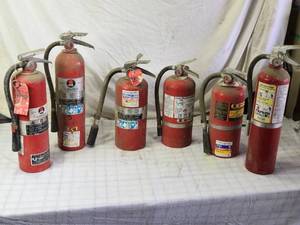 lot 58 image: Used Fire Extinguishers Assorted Brands and Conditions