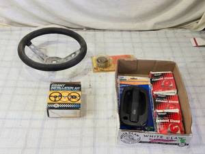 lot 59 image: Grant Steering Wheel and Installation Kit, Door Handle, Muffler Clamps