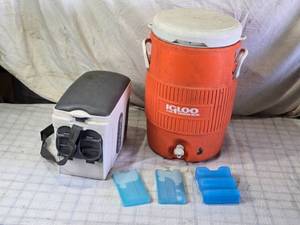 lot 100 image: Igloo 2-Gallon Cooler and Electric Cooler with Ice Packs