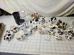 lot 126 image: Assorted Cow-Themed Mugs and Figurines Collection