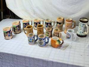 lot 133 image: Assorted Ceramic Beer Steins with Various Designs