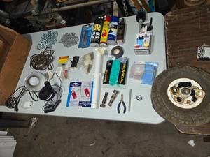 lot 192 image: Garage Items Including Tools, Hardware, and Wooden Tool Tray, Old Rubber Tires