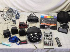 lot 198 image: Assorted Electronics Sylvania DVD Player, Headphones, GPS, and More