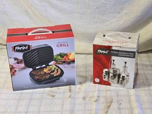 lot 224 image: Parini Electric Grill and 6-Piece Stainless Steel Condiment Set
