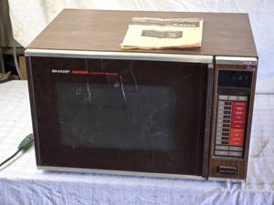 lot 240 image: Sharp Carousel Convection Microwave Oven with Manual - Model R-8320 - Heavy
