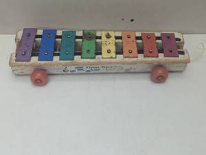 lot 45 image: Fischer Price Pull Behind Xylophone