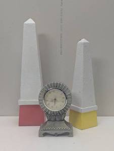 lot 50 image: 3 Piece Mantle Decor - 1 Pewter Clock with 2 Wood Pillars