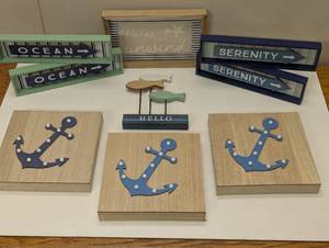 lot 19 image: 9 Piece Ocean Themed Home Decor - LED Signs to Shelf Decor