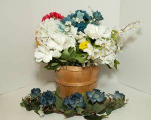 lot 10 image: Variety of Faux Flowers and Basket
