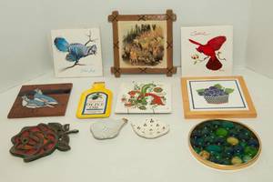 lot 84 image: Six Trivets and Three Spoon Rests