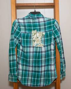 lot 167 image: WHOLE BOX Full of MN Flannels and MN Aprons