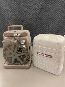 lot 37 image: Vintage Bell & Howell 8mm Film Projector with Carrying Case