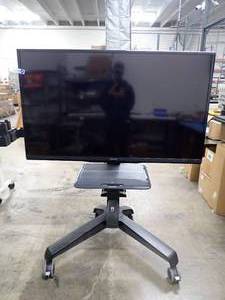 lot 45 image: Aquos&nbspLC-60C6500U TV on mobile cart  TV has 60 screen with 1920 x 1080 HD Resolution  Includes power cable  will need a larger vehicle for removal 