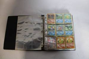 Collection of First Edition Vintage Pokémon Cards including Charmander and Rare Holo Mewtwo