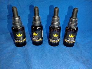 lot 186 image: Four New 1 oz Bottles of Organic 3000 mg CBD Oil