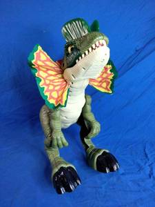 lot 202 image: Imaginext Jurassic World Thrash Attack Dilophosaurus Dinosaur Toy with Lights & Sounds