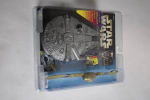 lot 35 image: Star Wars Millennium Falcon Collector Timepiece with C-3PO Keychain
